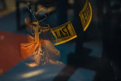 Everlast gloves in the ring with a reflection of the Cuban flag